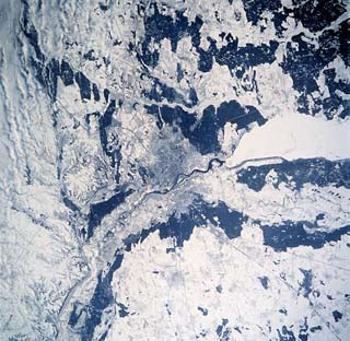 Mid-winter view of Kiev, Ukraine, iced over Dnieper river.